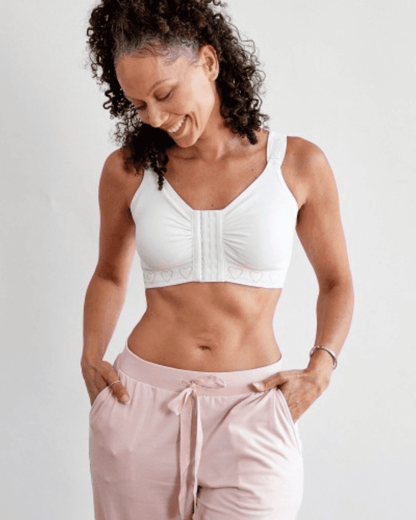 Cancer Research UK Post-Surgery Comfort Bra - Soft bamboo fabric bra designed for breast cancer patients. Offers comfort and support after mastectomy or breast cancer surgery. Available in white, black, and blush. Sizes range from Small to XXL. 100% net profits fund breast cancer research.