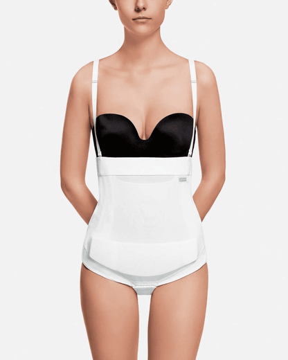 Image of Recova tummy tuck female supporter with adjustable Velcro side openings. This post surgery compression garment provides optimal compression through double skin reinforcements. It includes a unique pocket with a removable foam insert for targeted scar area compression. With detachable and adjustable shoulder straps, flat seams, and compatibility with EPI-FOAM Pads, it is ideal for abdominoplasty, pubic procedures, C-sections, or abdominal liposuction