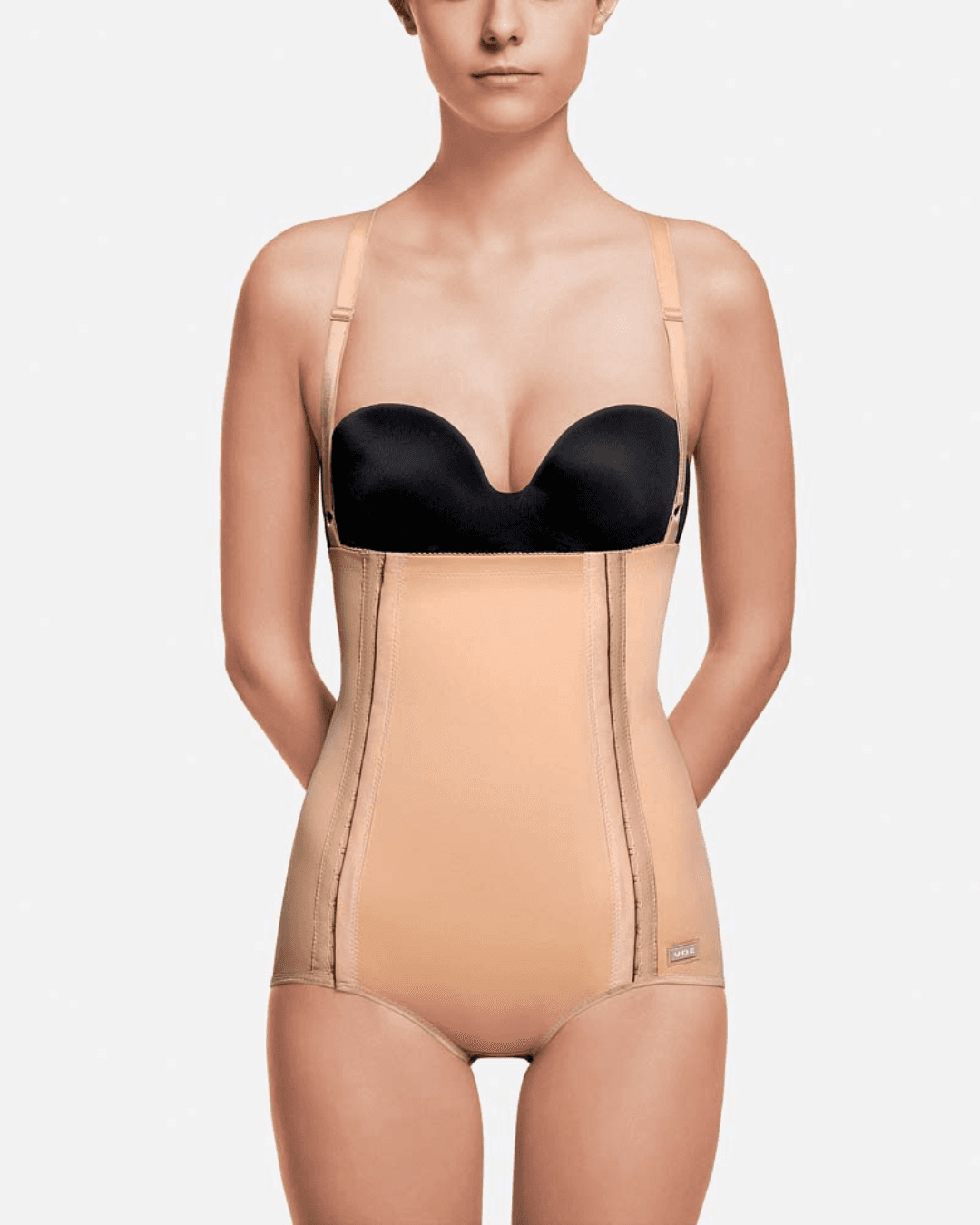 Image of Recova tummy tuck female supporter girdle with adjustable fasteners and double skin reinforcements. This compression garment offers optimal support and comfort for tummy tucks, C-sections, and abdominal liposuction procedures. Detachable shoulder straps provide versatility and easy customization.